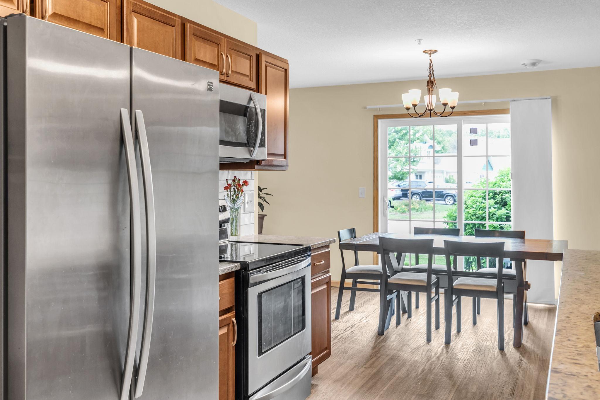 Kitchen/dining area + walkout to patio!