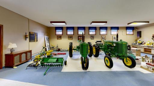Expansive finished lower-level flex/garage space with multiple potential uses.