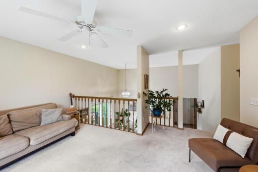 The living area overlooks the main level. Carpets were professionally shampooed in August 2026.
