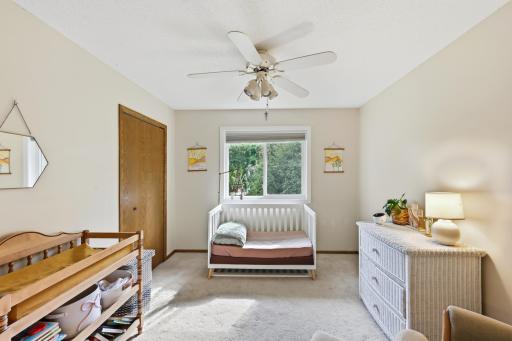 There are two bedrooms on the upper level of this home.