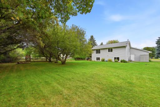 Partially fenced yard is owned by the neighboring owners. What a benefit!