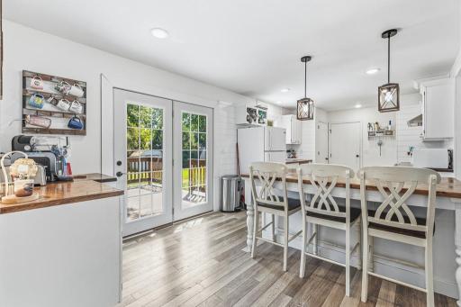 Dining/kitchen with deck and patio access