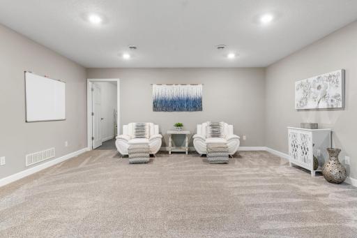 Finished LL w/ Family Room, Gaming Area, 4th Bedroom & abundant storage