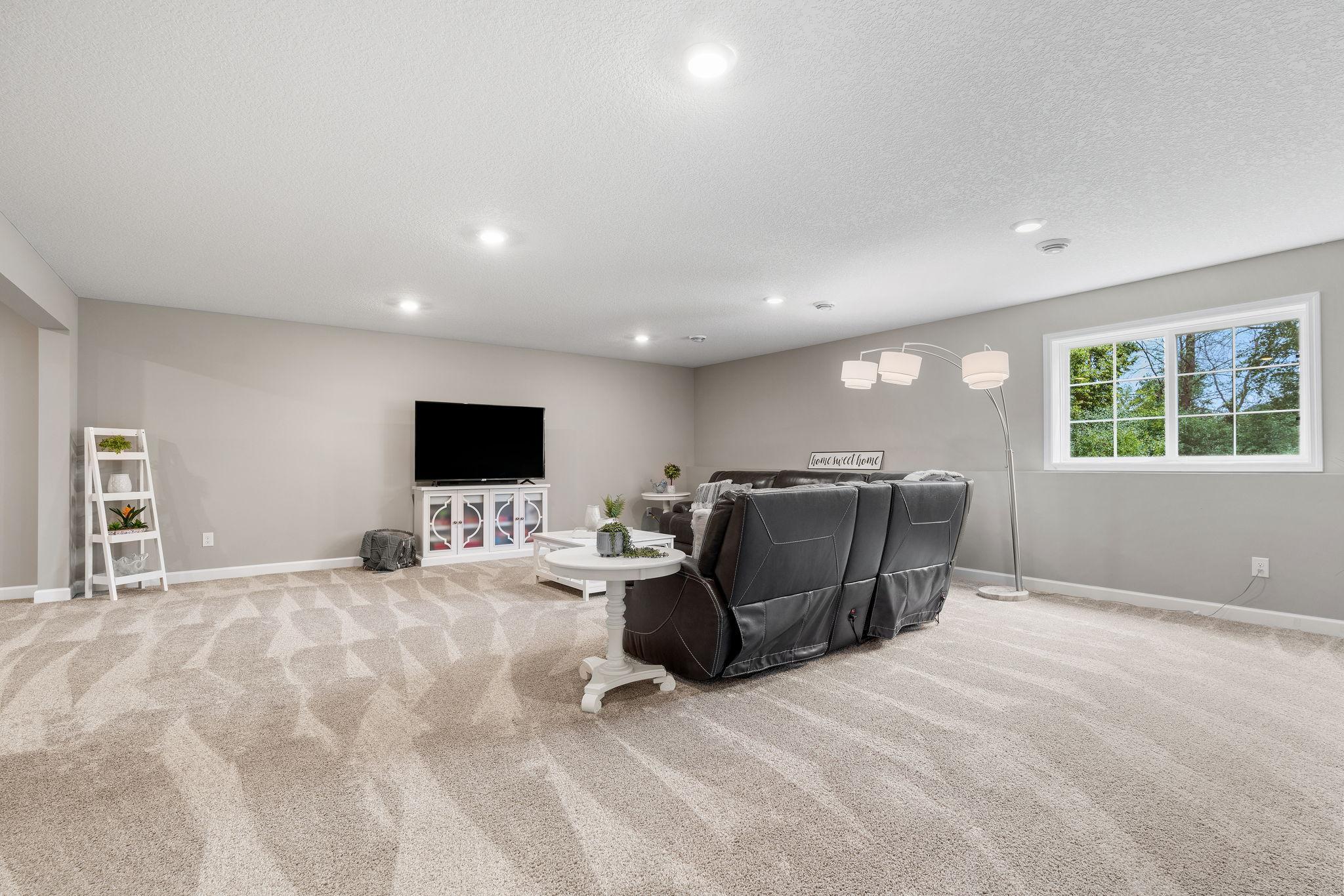 Finished LL w/ Family Room, Gaming Area, 4th Bedroom & abundant storage