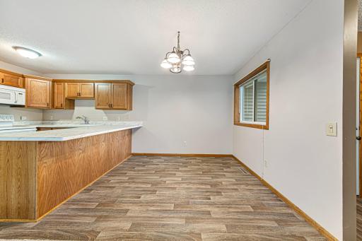 Dining room with new vinyl plank flooring