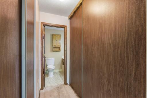 Hall way with storage on each side