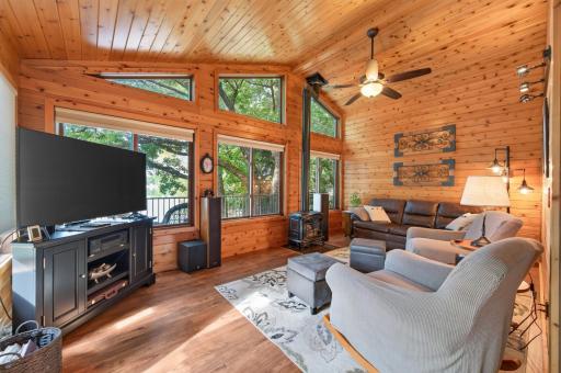 Cozy sunroom serves as perfect main level living area