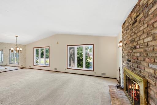 Living room and dining room with original classic light fixture!