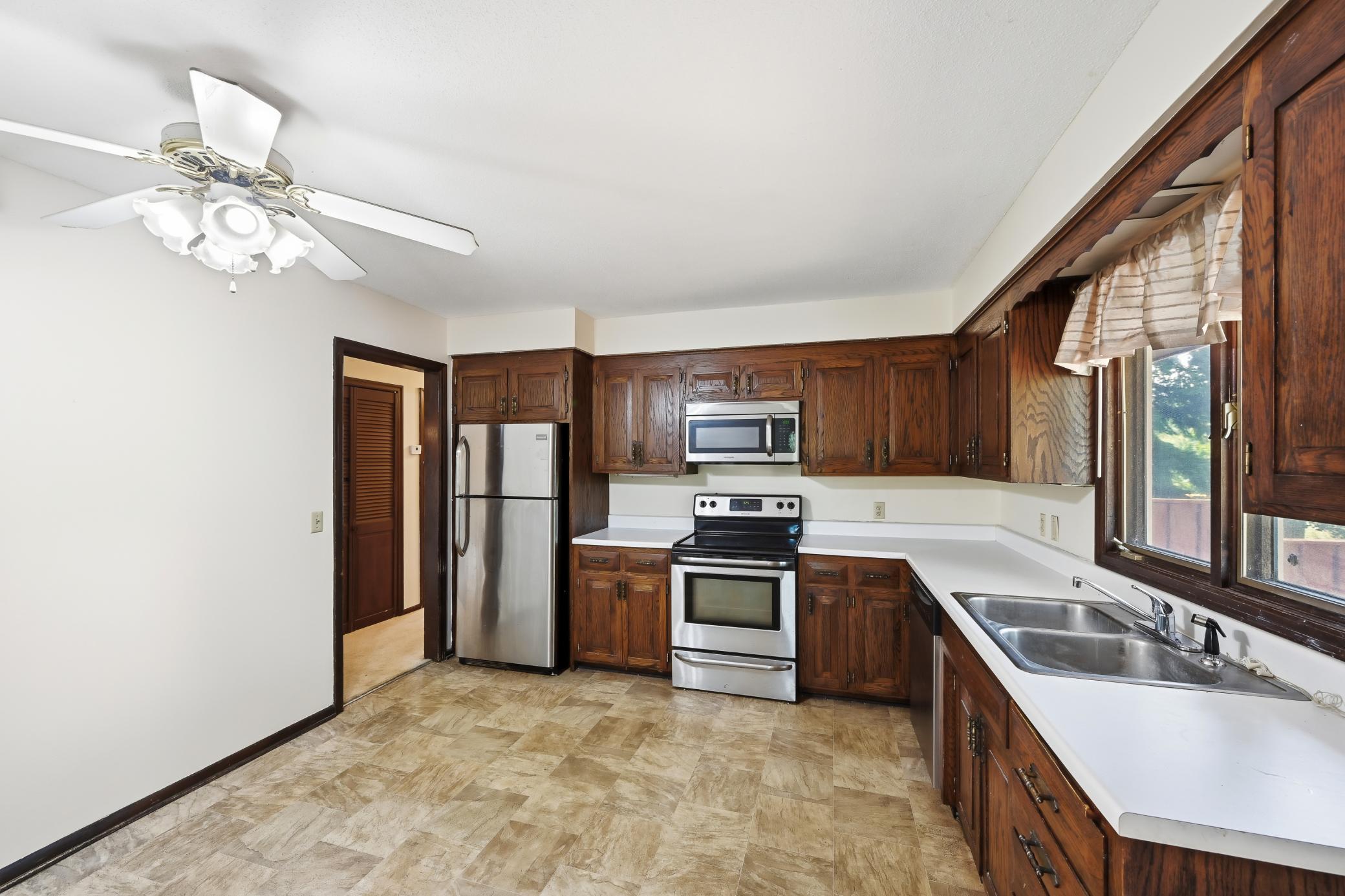 Plenty of retro solid wood cabinets. Stainless Steel appliances!