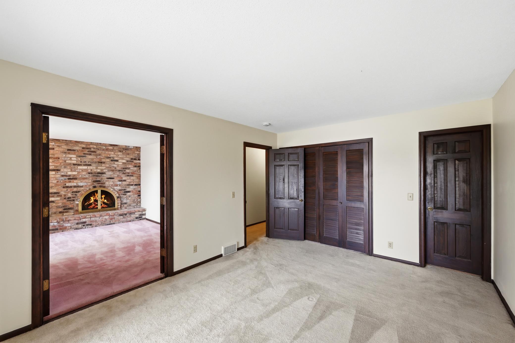 Possibly turning these 2 bedroom into a huge primary with wood burning fireplace!