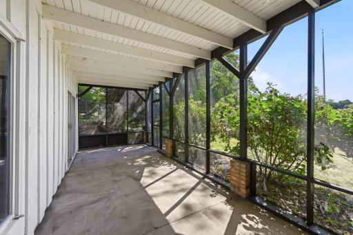 Patio was professionally painted. Enter your backyard through the screened door!