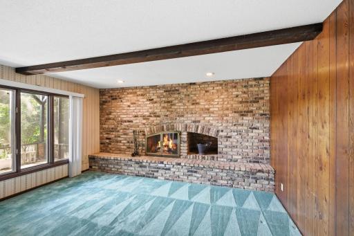 Wood beam ceiling. Walk out to your screened in patio!