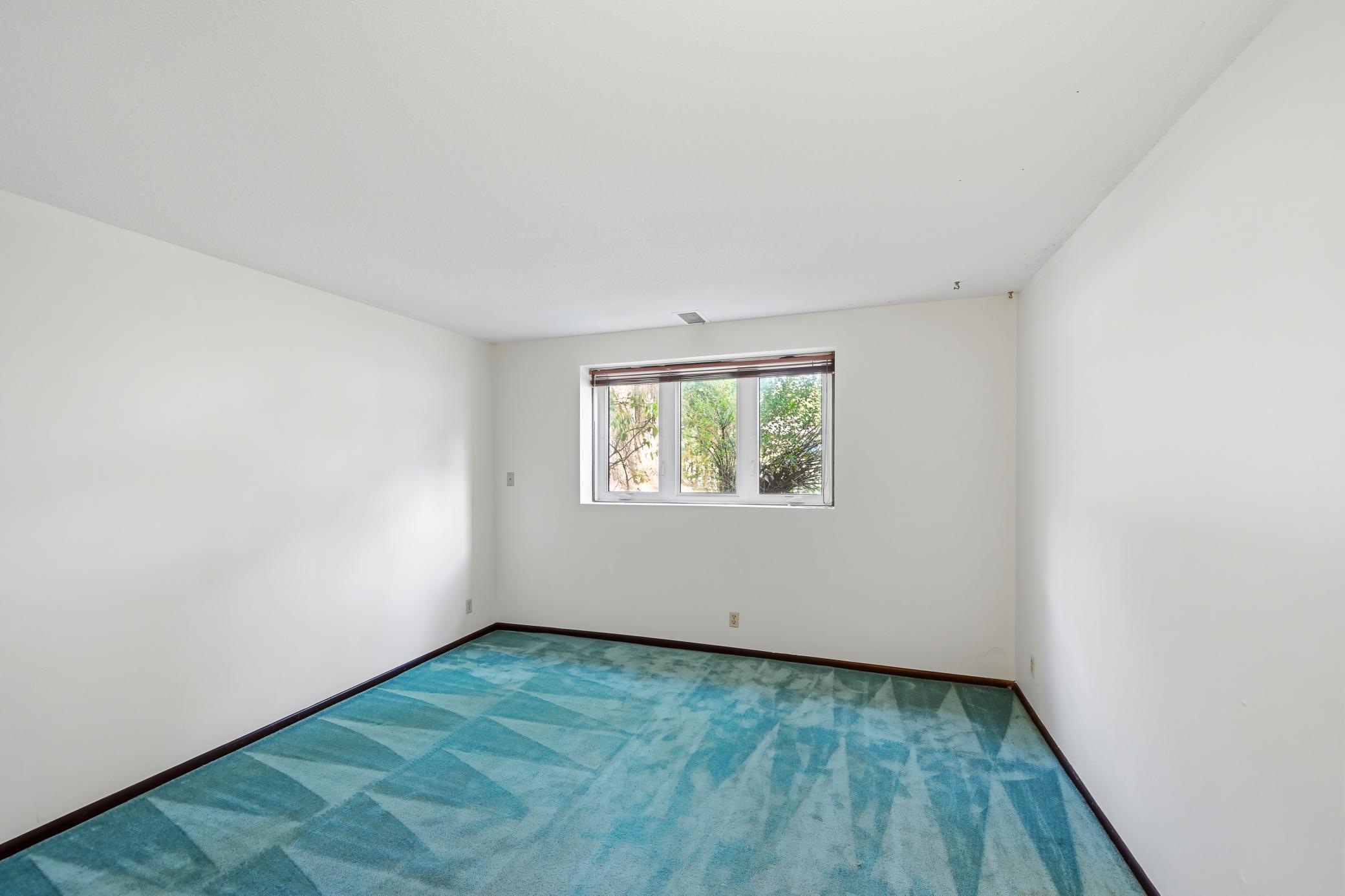 1st of 2 bedrooms in lower level! Newer windows!
