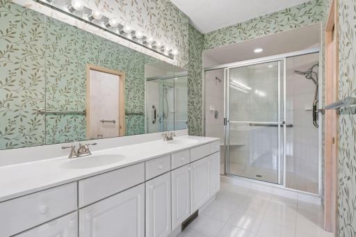 Double vanity compliments the double shower