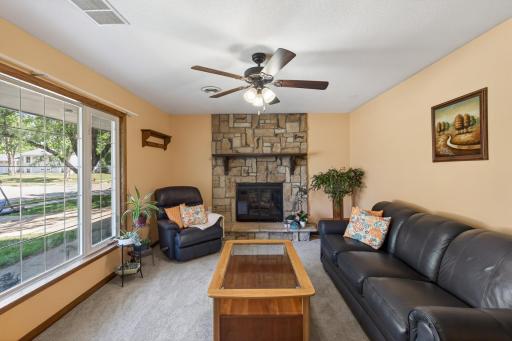 Main floor family room with a cozy gas fireplace