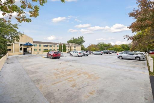 Large parking lot with reserved spot.