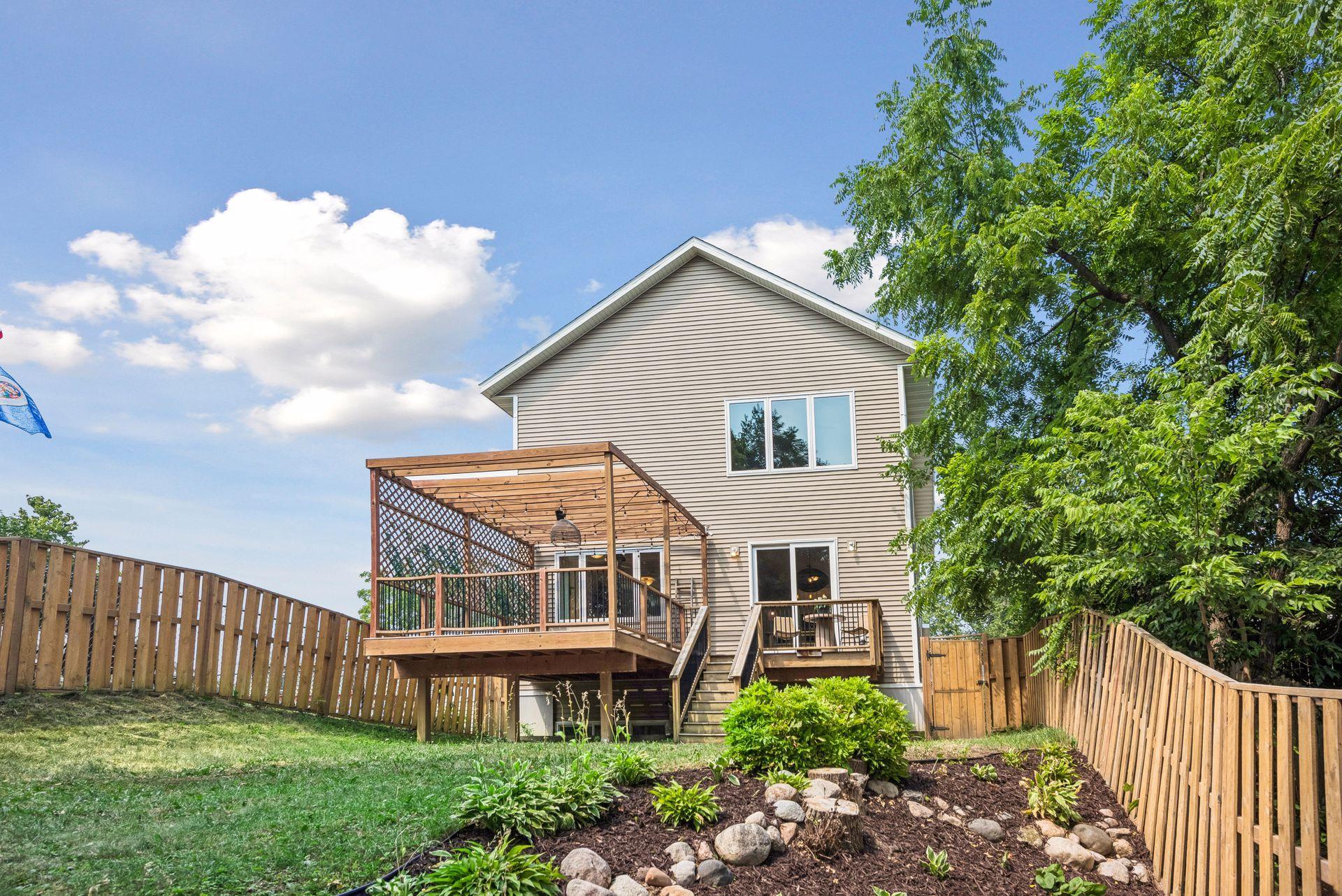 Beautiful landscaping and open green space create a peaceful setting for entertaining, family activities, or enjoying Minnesota's seasons.