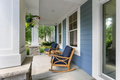 Easy summer mornings on the covered front porch with wood ceiling and recessed lights.