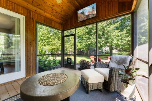 A view of the private backyard from the screened porch.
