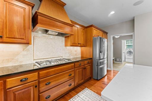 Another view of the kitchen layout. There is abundant counter space and storage for all your kitchen needs.