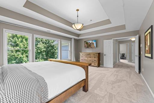 This view showcases the wall of windows filling the room with natural light.