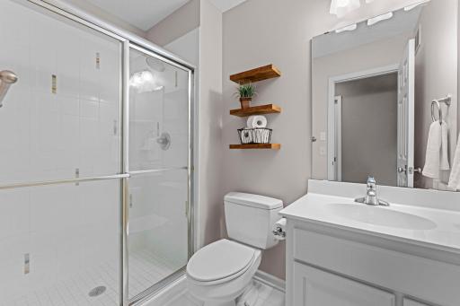 The second bedroom's private 3/4 bathroom.