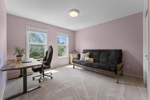 The fourth bedroom on the upper level is bright and sunny and includes a large closet, and is connected to the full Jack & Jill bathroom.