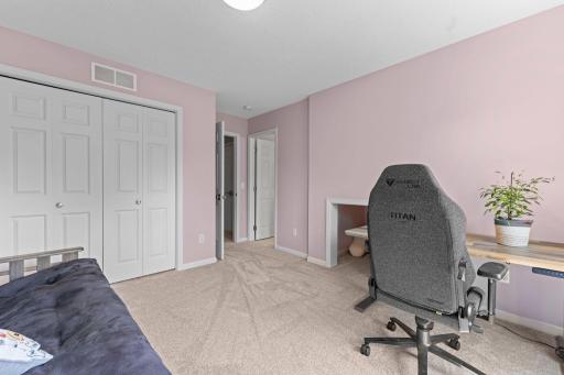 Don't miss the adorable nook next to the desk - a perfect play area.