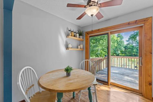Informal dining right off the deck. Room is large enough to add a larger table if needed.