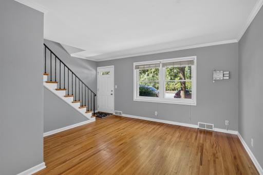 Main Level Living Room. Beautiful hardwood floors throughout the main level and upstairs.