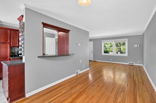 Main Level Dining Room sits adjacent to the Kitchen and Living Room
