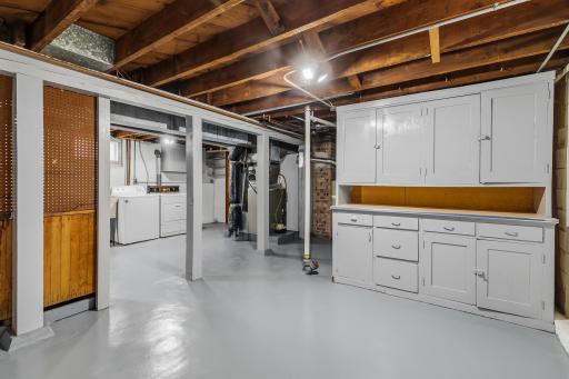 old kitchen cabinets installed for storage or workshop