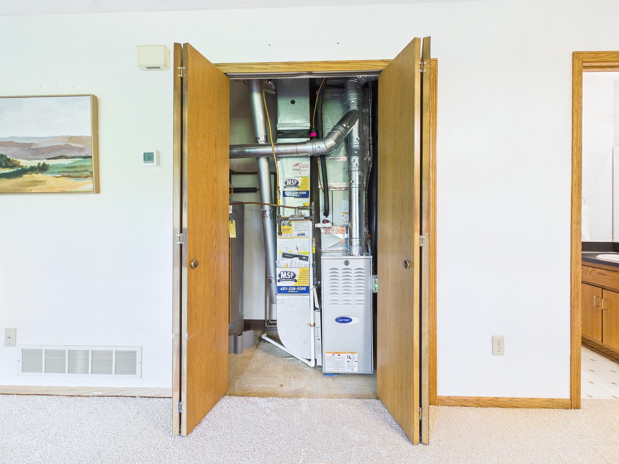 Handy utility closet with new (2025) furnace