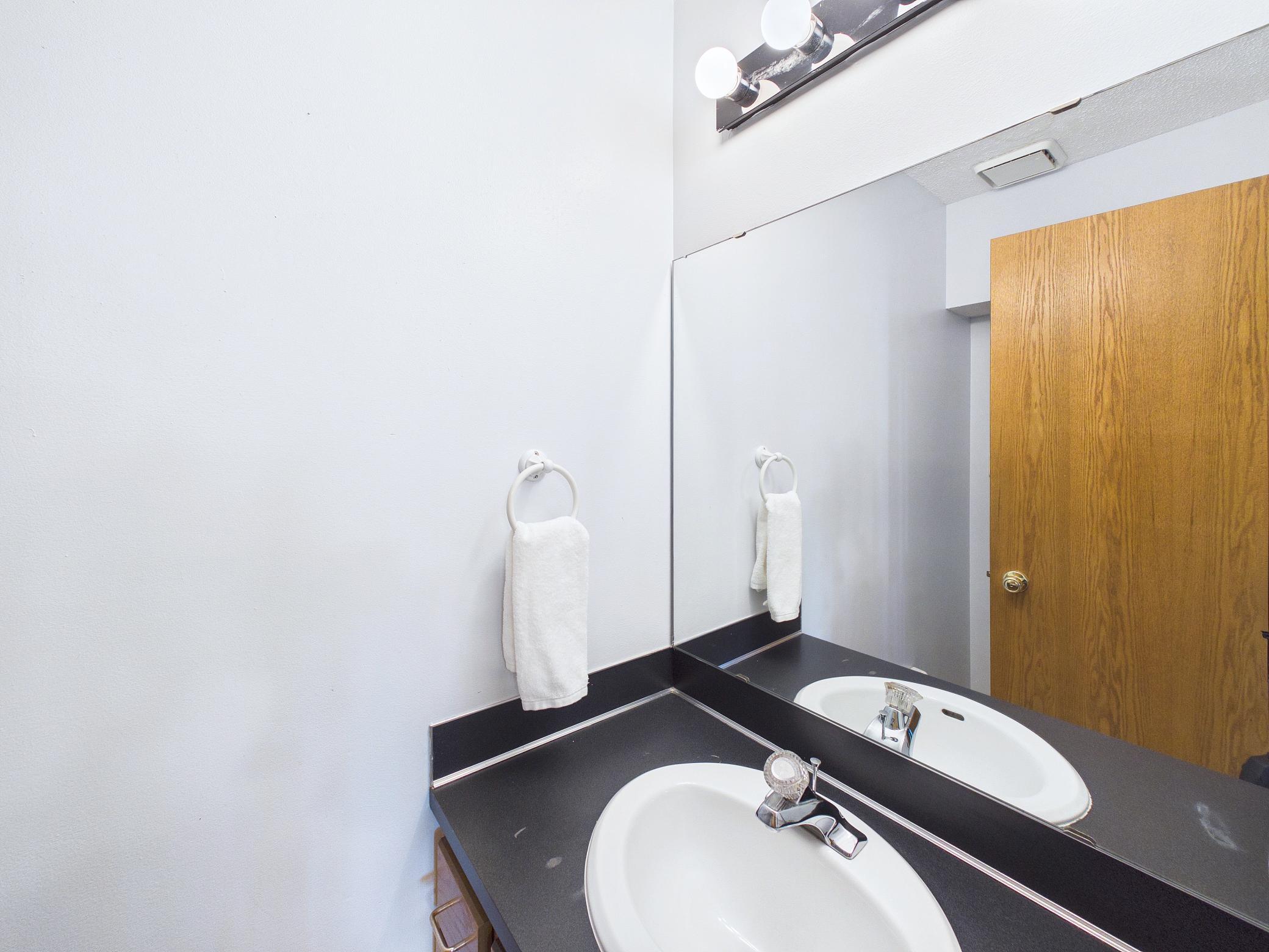 A convenient main-floor half bath makes for easy hosting. hosting.