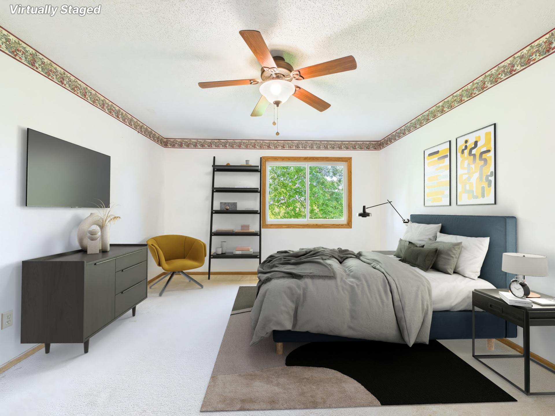 The Primary bedroom has plenty of space for furnishings and a large walk-in closet. Virtually staged for inspiration.