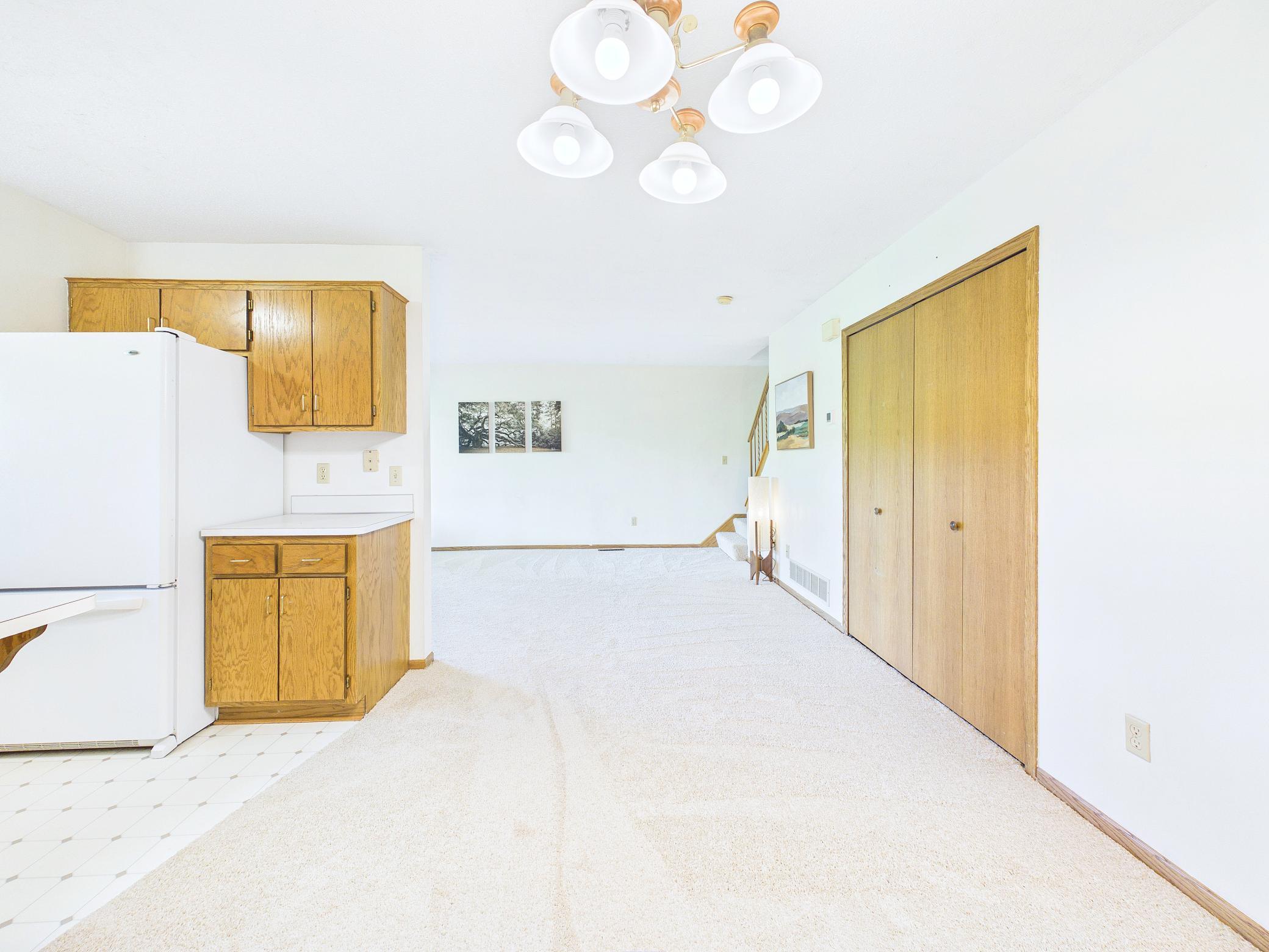 Entering from the garage into the dining area .