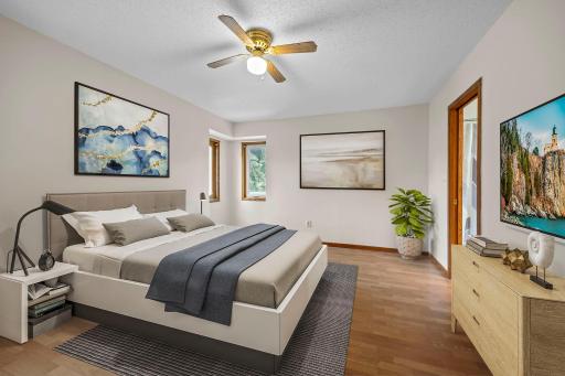Primary suite with walk-through bath and large closet VS