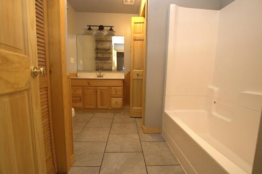 Remodeled Bathroom with Large Storage Closet