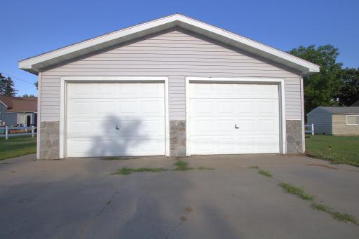 Two Car Garage with Concrete Driveway
