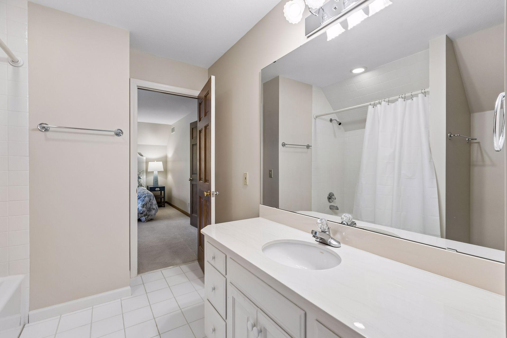 Upper-level Bedroom 3 has access to a shared Jack-and-Jill bathroom with Bedroom 4.