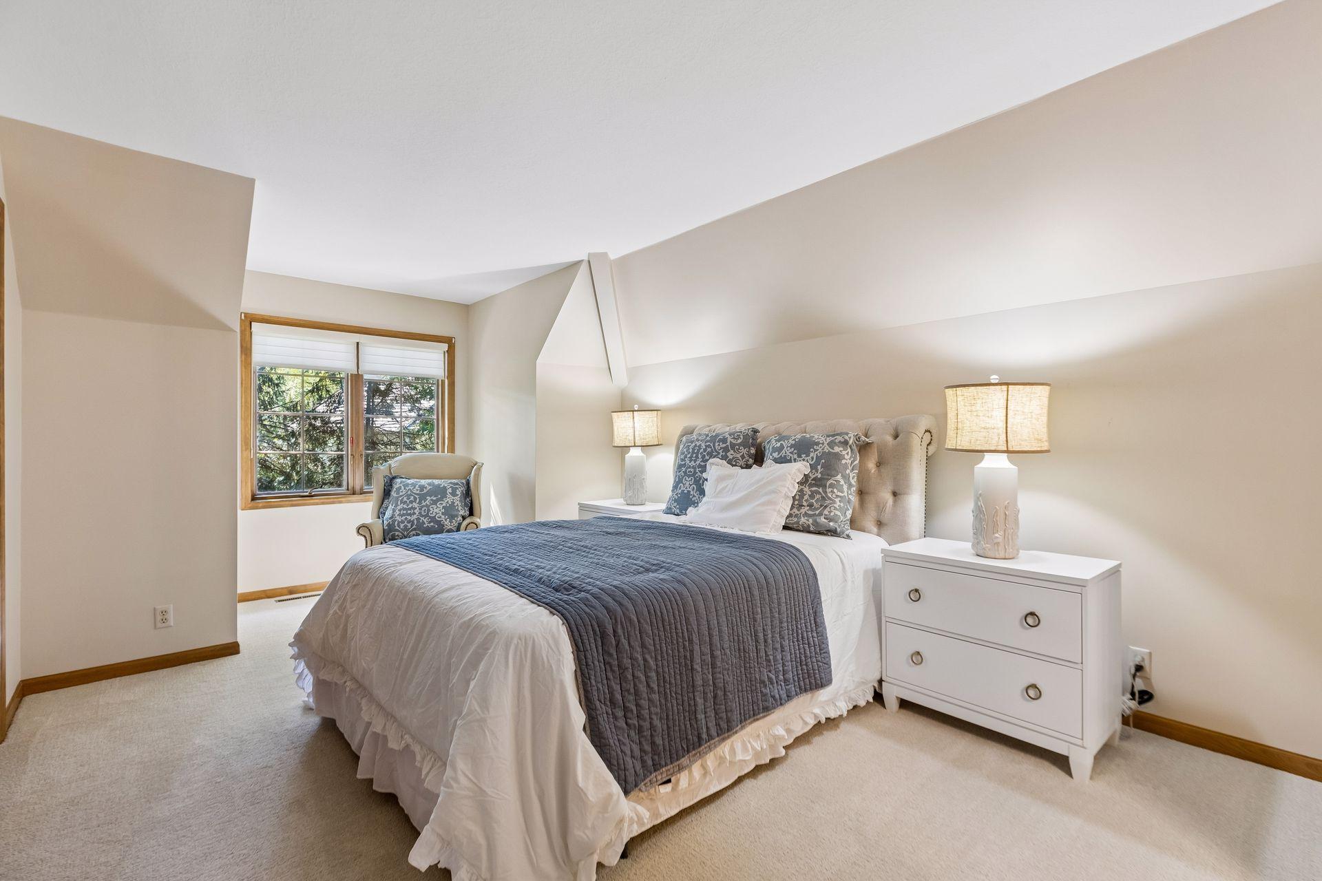 Upper-level Bedroom 3 offers a bright, comfortable layout and generous space.