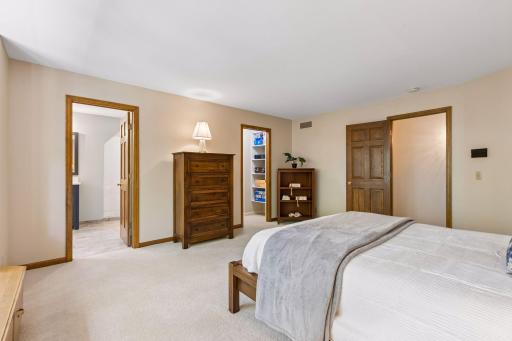 Upper-level Bedroom 2 includes a private Â¾ bathroom and a spacious walk-in closet.