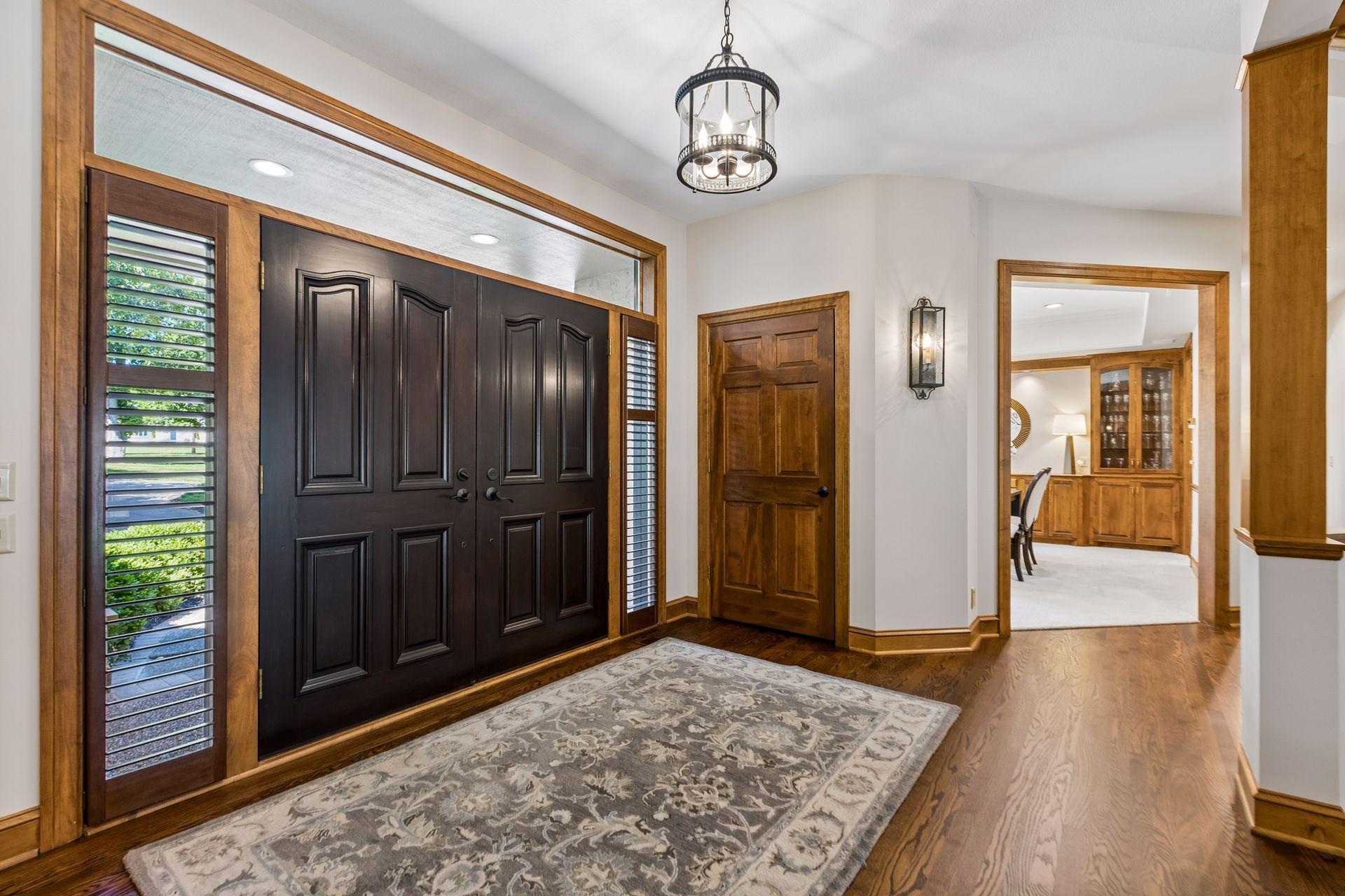 A generous foyer creates an impressive entry as you step inside.