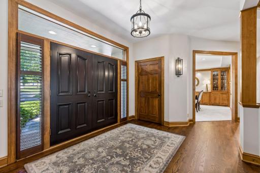 A generous foyer creates an impressive entry as you step inside.