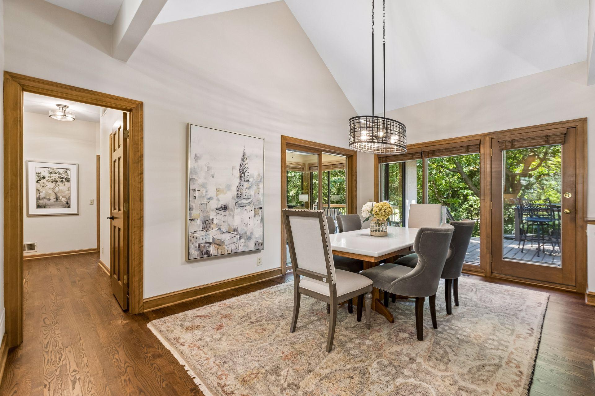 Hallway off the dining area leads to the walk-in pantry, mudroom, laundry room, and craft room.