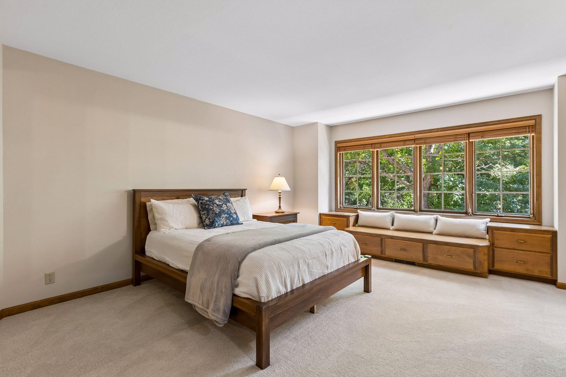 The second bedroom on the upper level functions as an additional primary ensuite, offering comfort and flexibility.