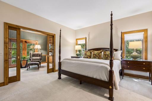 Spacious main-floor primary suite with direct access to the adjoining office.