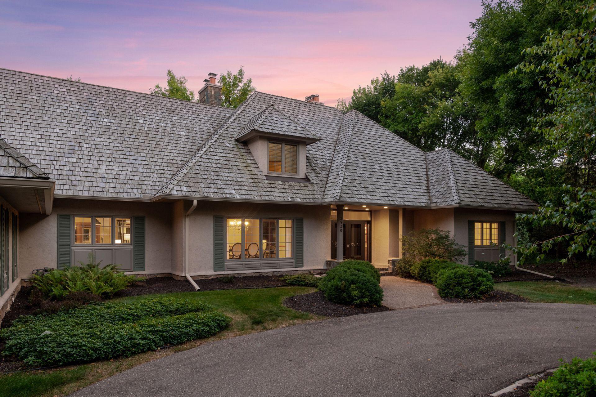 Another view of the inviting front entry just off the circular driveway. The entire exterior was painted in 2024.