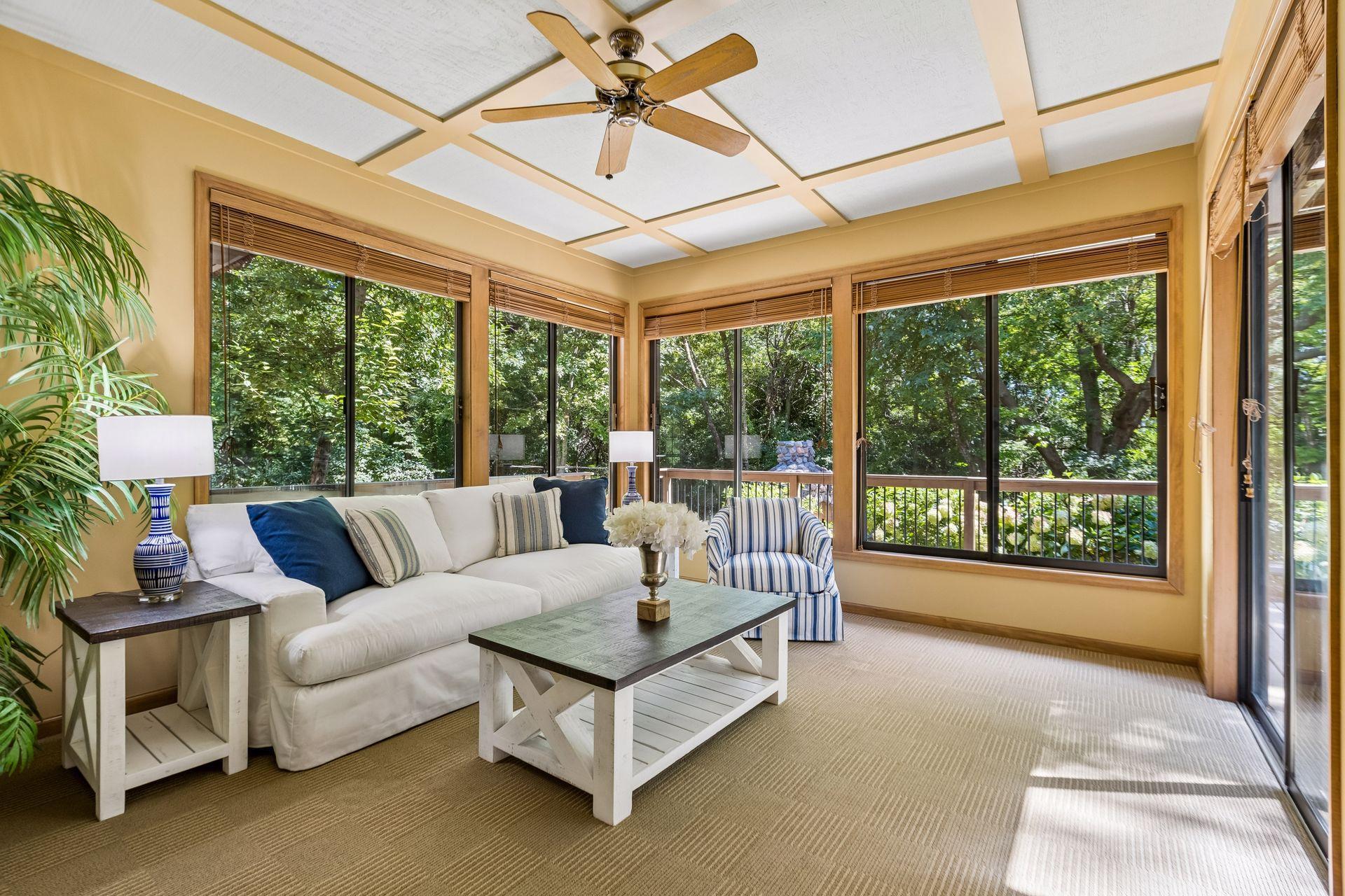 3-season porch with views of the backyard and convenient access to the deck.
