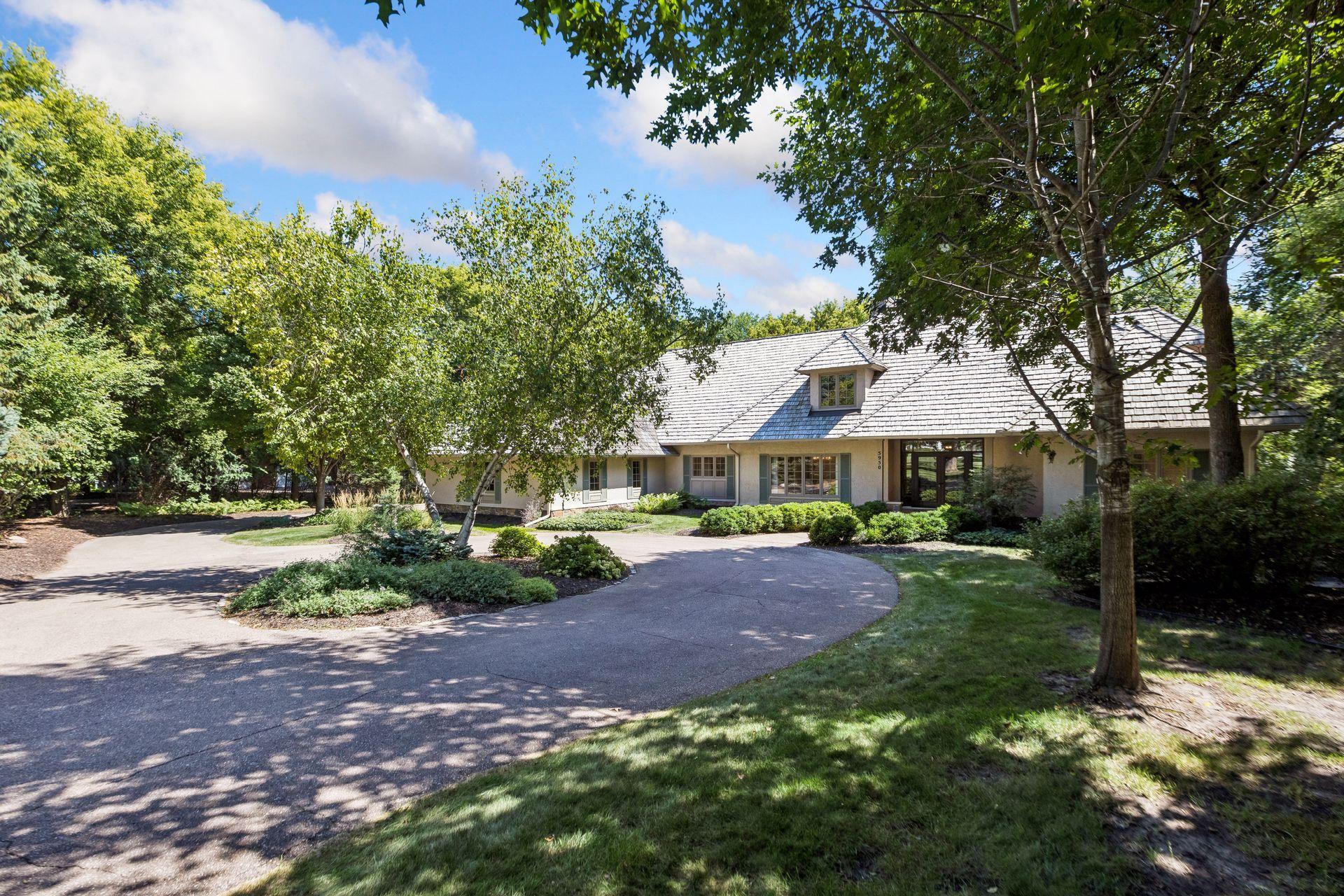 A welcoming, professionally landscaped front yard enhances the home’s curb appeal.
